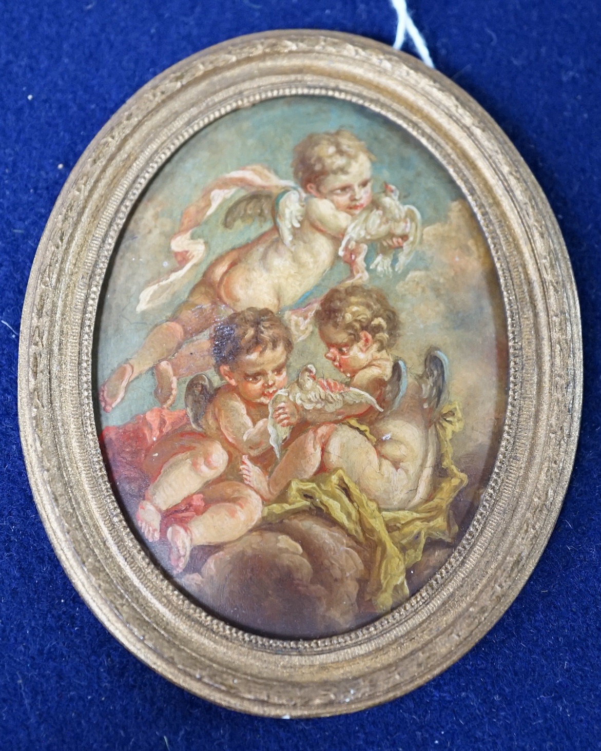 18th/19th century school, miniature oval oil on copper of Amorini, gilt framed, 7.5 x 5.5cm. Condition - fair to good